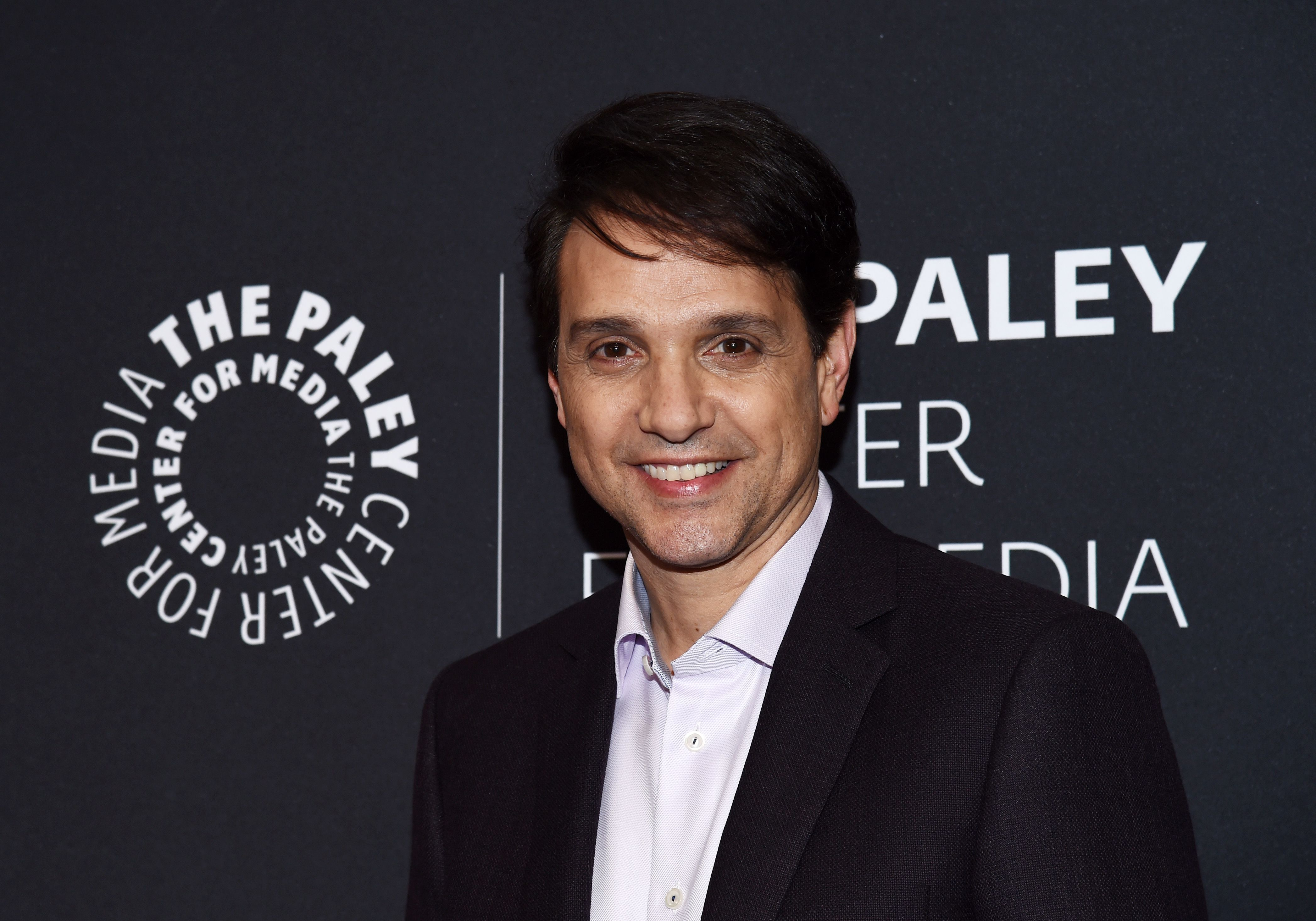 Ralph Macchio net worth source – iconic Karate Kid training scene with Mr. Miyagi